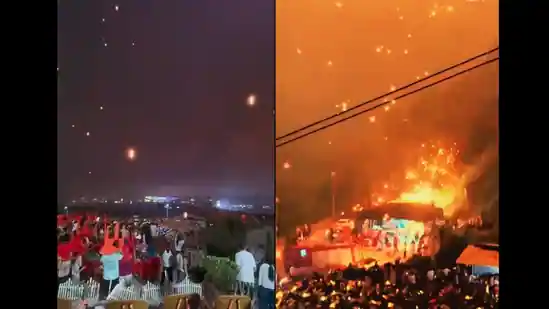 Fireworks display in China turns chaotic as flames fall on the crowd.